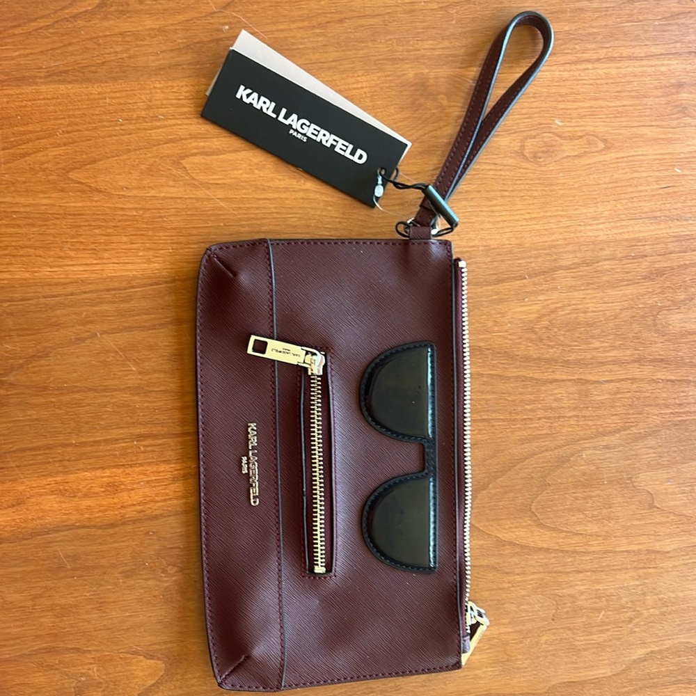 Karl Lagerfeld wristlet with cute sunglasses print , color burgundy